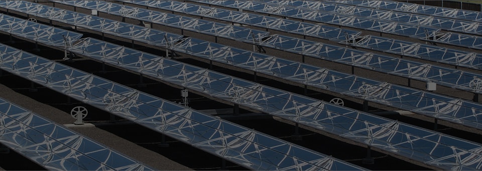 Several rows of solar panels made with 3M mirror film.