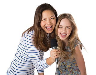 Two girls wearing Clarity Advanced Ceramic Braces by 3M Oral Care Solutions