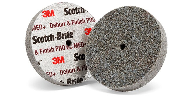 Bild verschiedener verpresster Scotch-Brite™ Deburr & Finish PRO Kompaktscheiben
