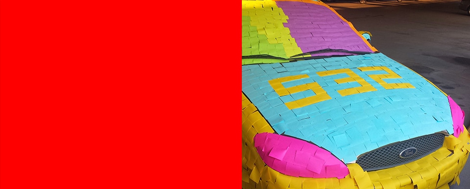 Police detective Stuart Littlefield’s car covered in colorful Post-it Notes, a clever prank done by co-workers.