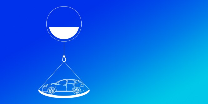 Leichtbauwagen auf einer Waage
