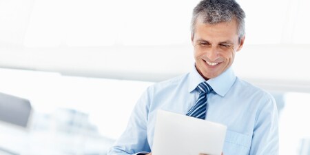 Man is reading something
