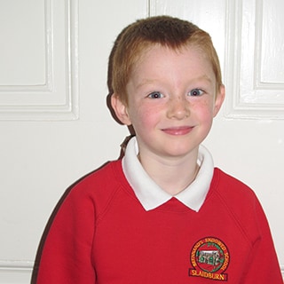 Andrew, a student at Brennand’s Endowed Primary School