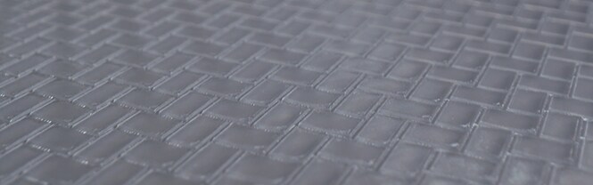 Nahaufnahme des 3M™ Trizact™ CMP-Pads mit Groove Design
