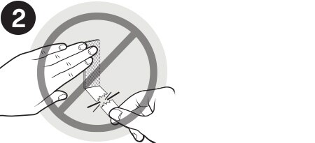 Entfernen von Command Strips von einer Wand
