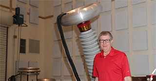 Image of Bill Taylor in the 3M Lightning Lab where lightning voltage jolts products and pushes them to their limits.