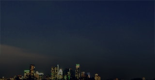 Nighttime image of the Austin skyline.